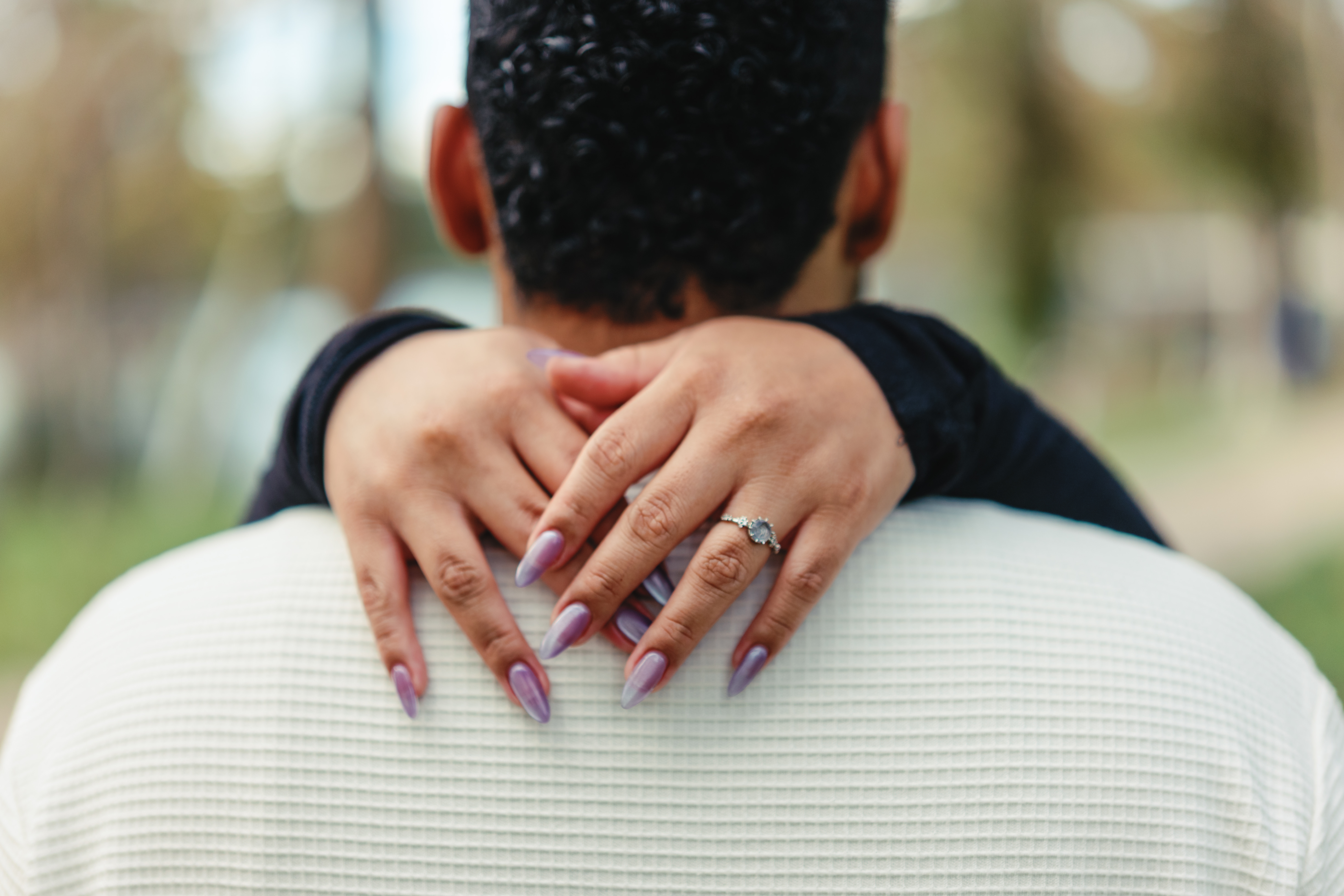 Couple holding hands outdoors