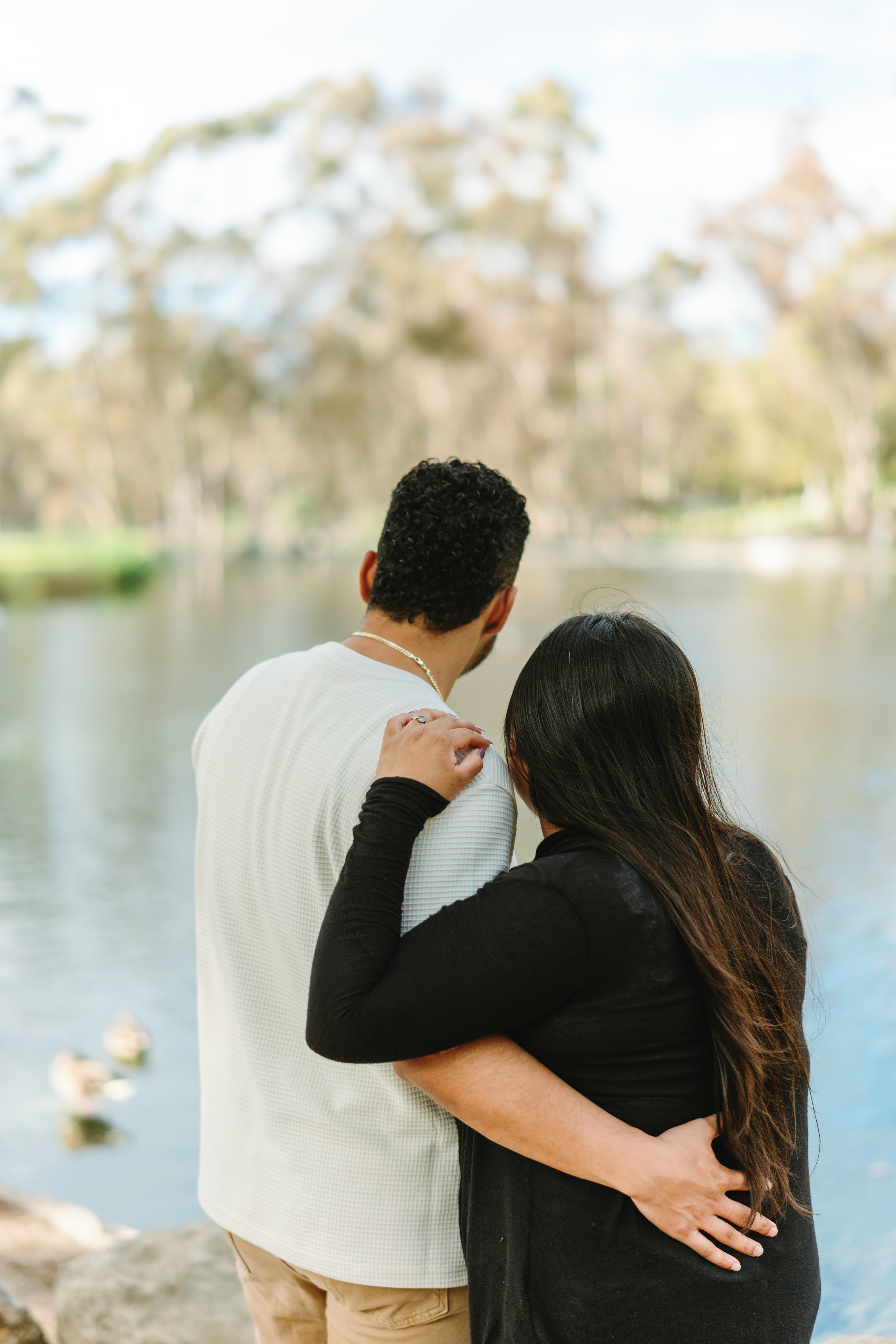 Vertical engagement portrait of the couple