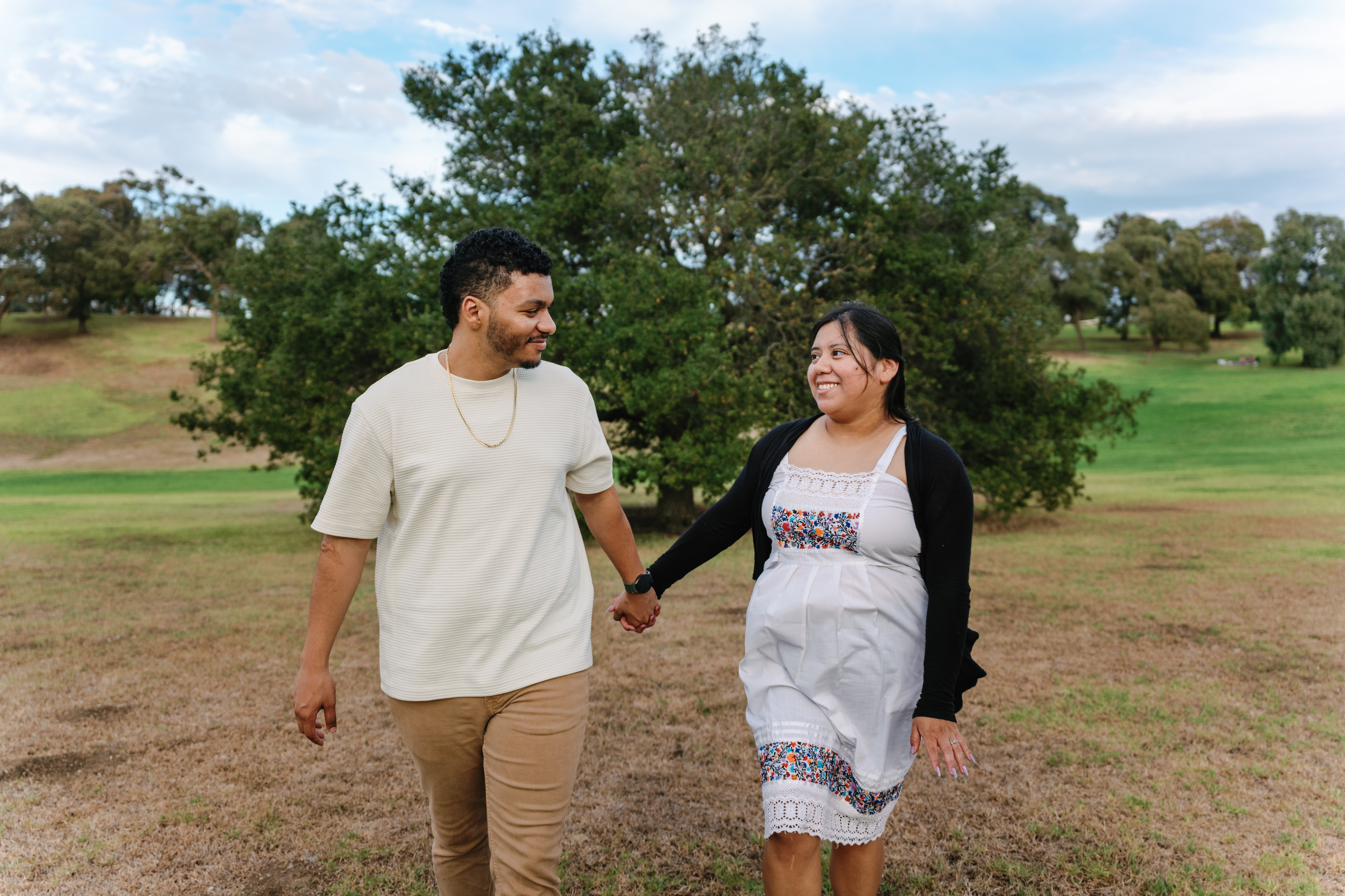 Couple standing together in a park